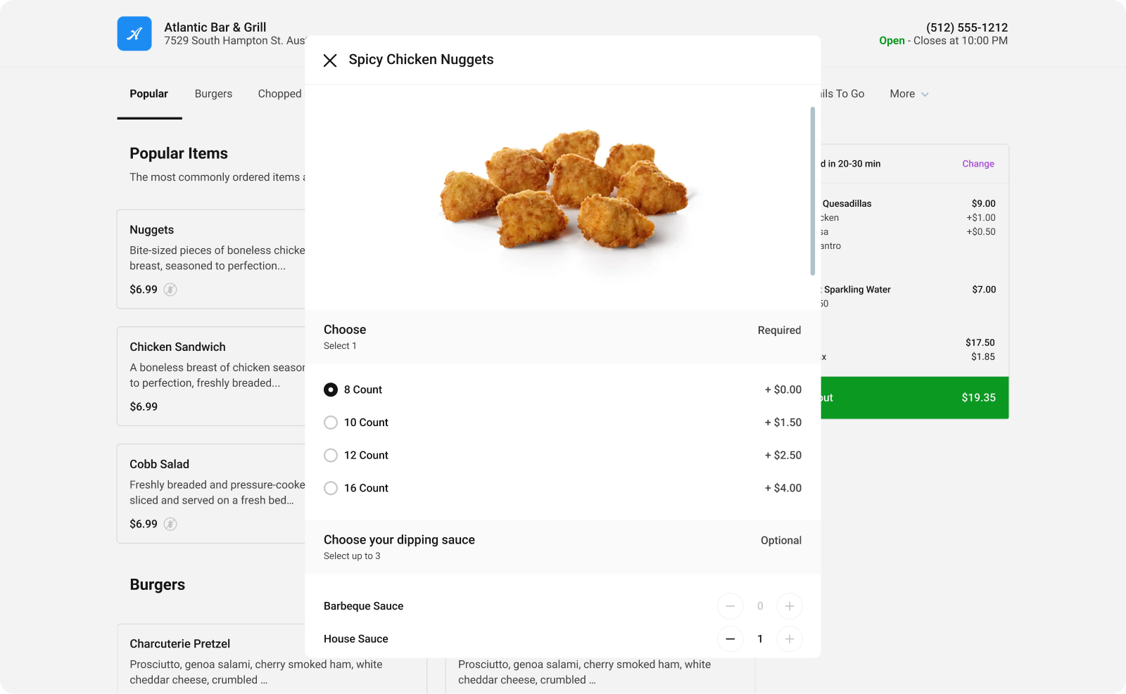 Item customization modal for Spicy Chicken Nuggets with a required count selection and an optional choice of dipping sauces
